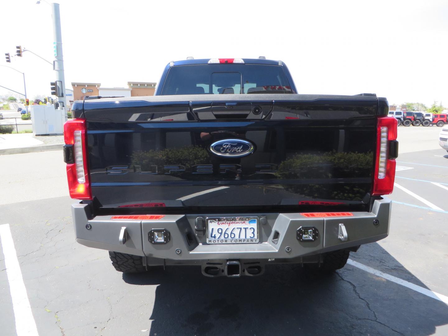 2023 BLUE /BLACK Ford F-350 SD Lariat Crew Cab Long Bed 4WD (1FT8W3BM9PE) with an 6.7L V8 OHV 16V DIESEL engine, 6A transmission, located at 2630 Grass Valley Highway, Auburn, CA, 95603, (530) 508-5100, 38.937893, -121.095482 - Sinister Diesel Built 23 Lariat Superduty with a ton of extras....... Sinister custom radius arms and traction bars, King Offroad shocks & Steering stabilizers, 18" Icon Rebound wheels, 37" Nitto Recon Grappler tires, Cat Back Exhaust, PMF rear leaf Springs, Sinister Front and Rear bumpers, Rigid Li - Photo#5